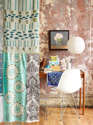 Patterned silk scarves sewn together to make a room divider