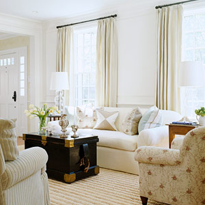 White living room with trunk table