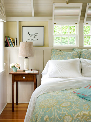 Bed with pillow headboard